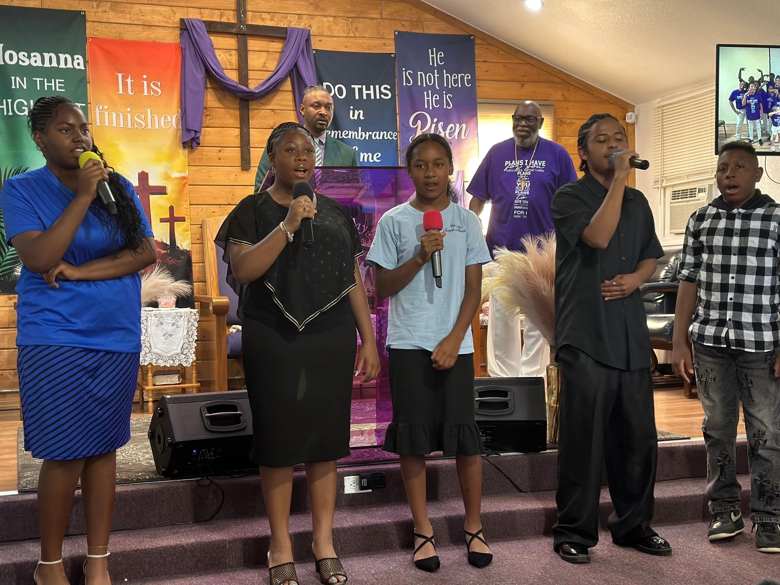 Choir and praise team in worship